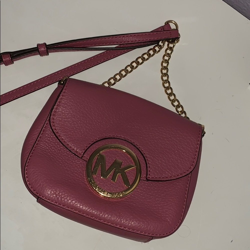 Pink Micheal Kors crossbody bag
